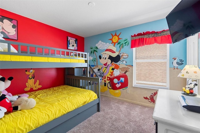 bedroom with baseboards and carpet floors