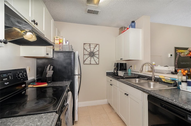 kitchen with visible vents, a sink, black appliances, under cabinet range hood, and dark countertops