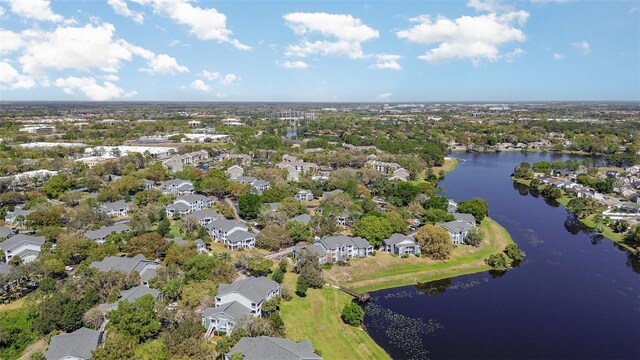 bird's eye view featuring a water view and a residential view