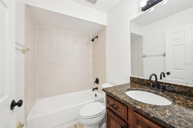 bathroom with vanity, toilet, and washtub / shower combination