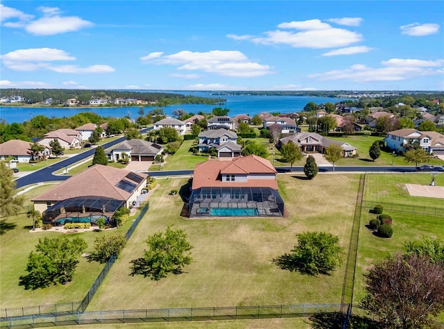 aerial view featuring a residential view and a water view