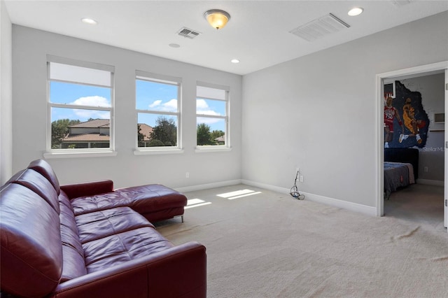 sitting room with recessed lighting, carpet flooring, baseboards, and visible vents