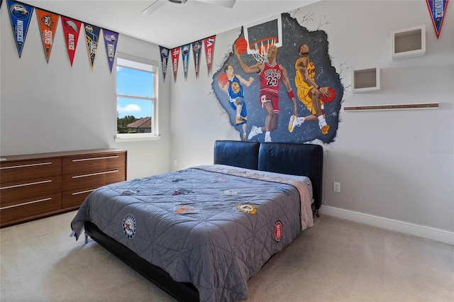 carpeted bedroom featuring ceiling fan and baseboards