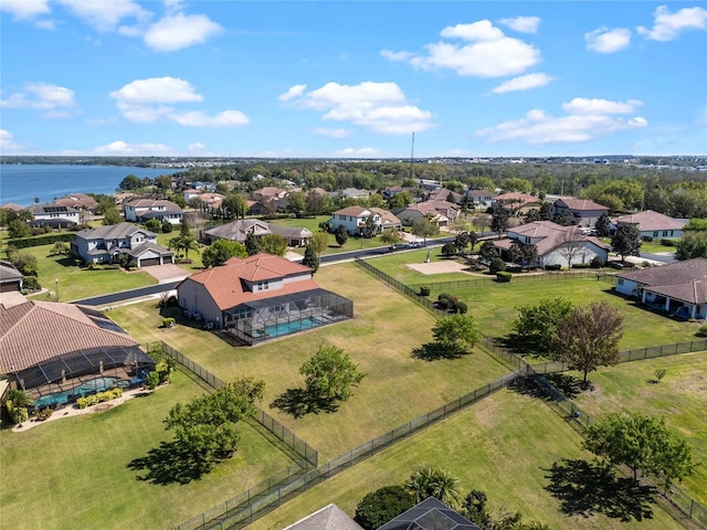 aerial view featuring a residential view and a water view