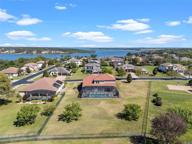 aerial view featuring a residential view and a water view