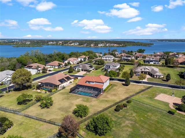 aerial view featuring a residential view and a water view