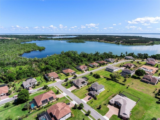 bird's eye view featuring a water view and a residential view