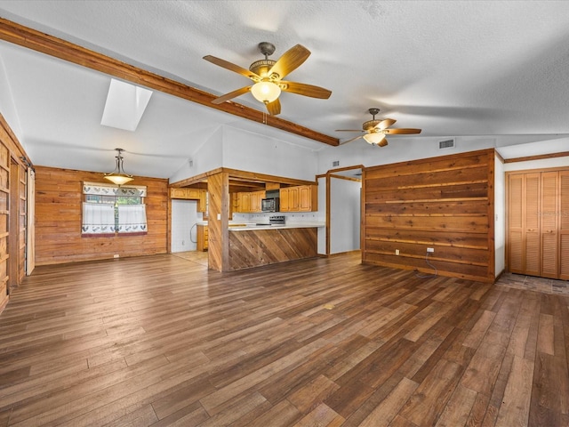 16510 Quarter Horse Ct, Montverde, FL 34756 - unfurnished living room featuring wood finished floors, visible vents, and ceiling fan