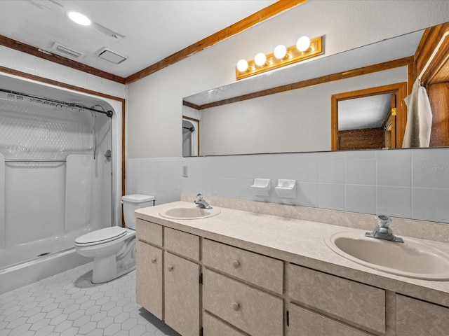 16510 Quarter Horse Ct, Montverde, FL 34756 - bathroom with a sink, a shower, toilet, and tile walls