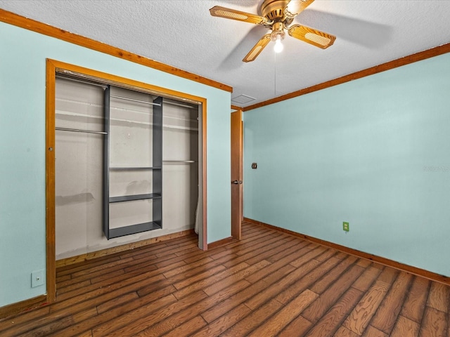 16510 Quarter Horse Ct, Montverde, FL 34756 - unfurnished bedroom with wood finished floors, ceiling fan, ornamental molding, a closet, and a textured ceiling