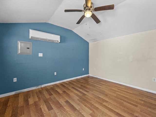 16510 Quarter Horse Ct, Montverde, FL 34756 - interior space with baseboards, ceiling fan, a wall mounted air conditioner, vaulted ceiling, and wood finished floors