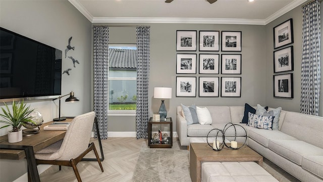 living area featuring a healthy amount of sunlight, crown molding, baseboards, and ceiling fan