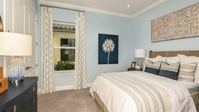 bedroom with recessed lighting, ornamental molding, baseboards, and carpet floors