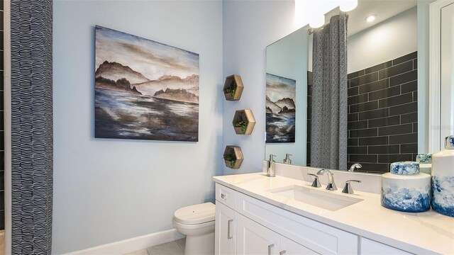 bathroom featuring tile patterned flooring, baseboards, toilet, a shower with curtain, and vanity