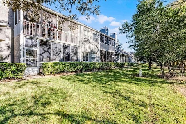 exterior space featuring a lawn