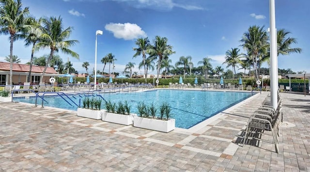 pool featuring a patio area