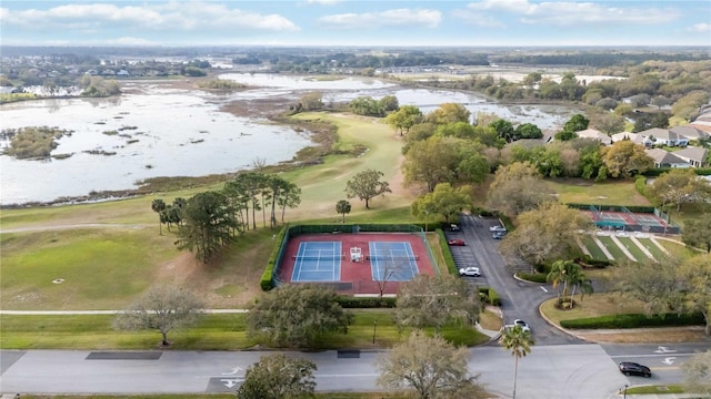 drone / aerial view with a water view