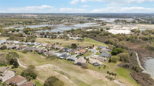 birds eye view of property featuring a residential view and a water view