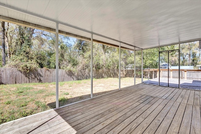 unfurnished sunroom featuring plenty of natural light