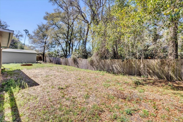 view of yard with fence