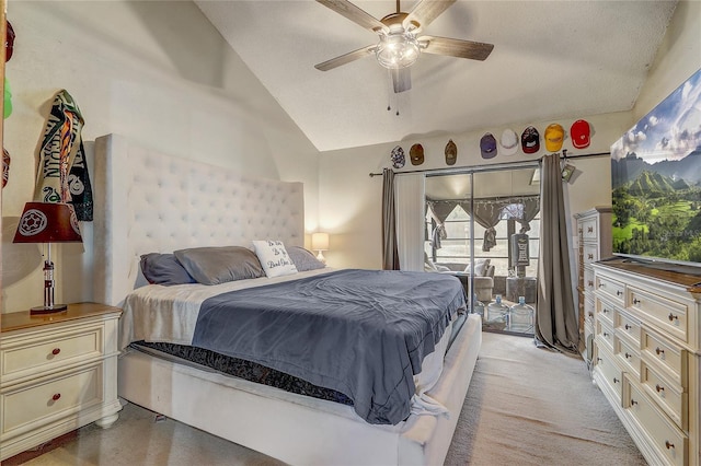 bedroom featuring ceiling fan, access to exterior, light carpet, and vaulted ceiling