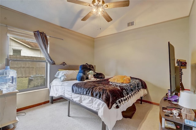 bedroom featuring visible vents, lofted ceiling, baseboards, and carpet flooring