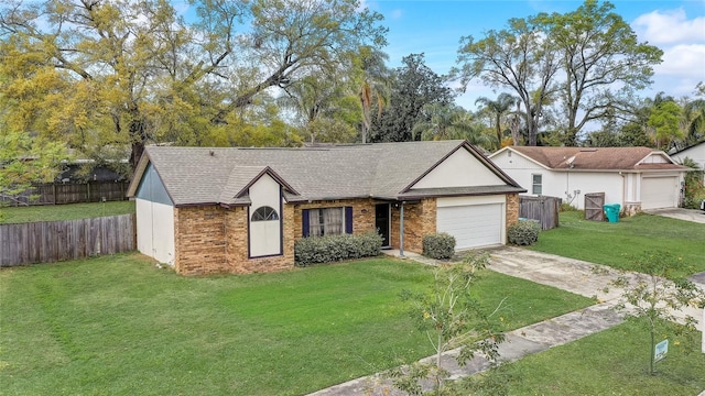 single story home featuring concrete driveway, a garage, brick siding, and a front yard