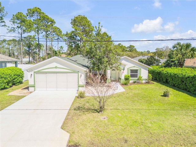 view of front of property with a garage, stucco siding, driveway, and a front yard