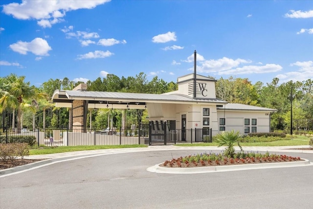 view of property with fence