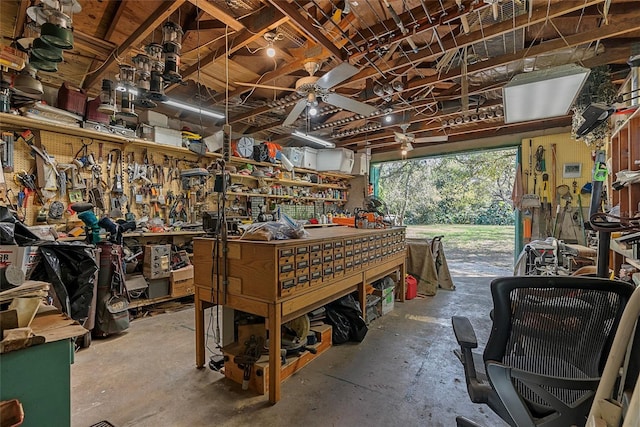 garage with a workshop area