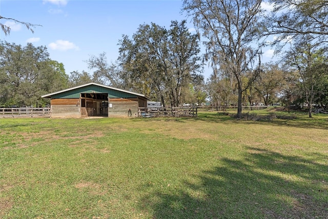 view of yard with an outbuilding and an exterior structure