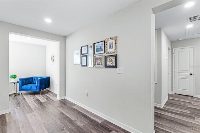 sitting room with visible vents, recessed lighting, baseboards, and wood finished floors