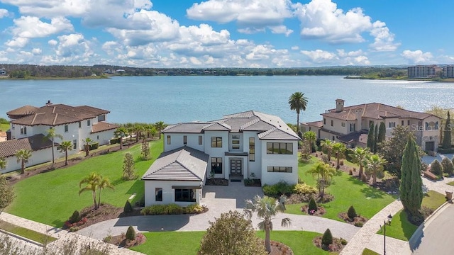 bird's eye view featuring a residential view and a water view