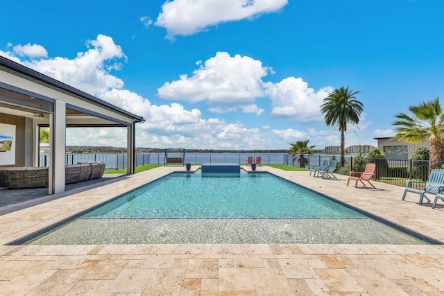 view of swimming pool with a fenced in pool, fence, and a patio area