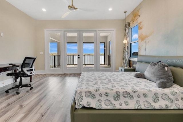 bedroom with wood finished floors, baseboards, recessed lighting, french doors, and access to outside