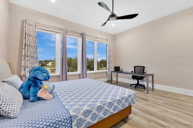 bedroom featuring recessed lighting, a ceiling fan, baseboards, and wood finished floors