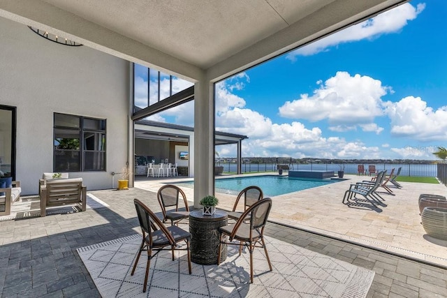 view of patio featuring a fenced in pool