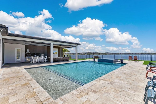 view of pool with a fenced in pool, a patio area, and fence