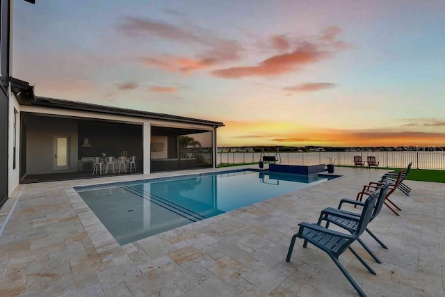 view of pool featuring a patio area, a fenced in pool, and fence