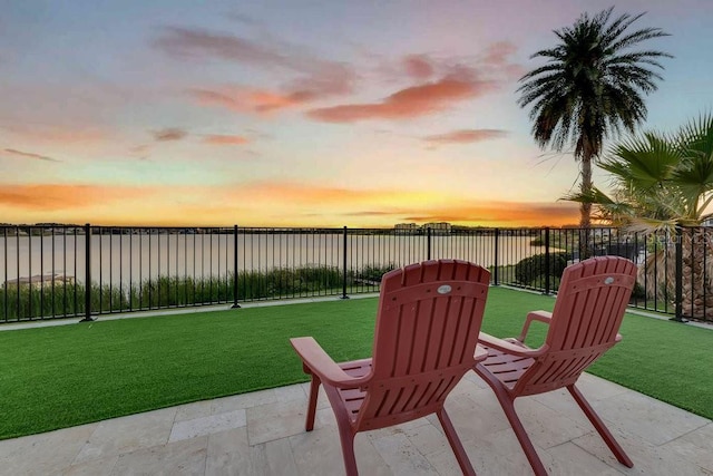 view of patio featuring fence