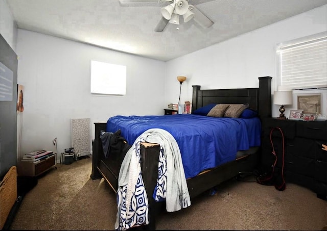 bedroom with carpet floors and a ceiling fan