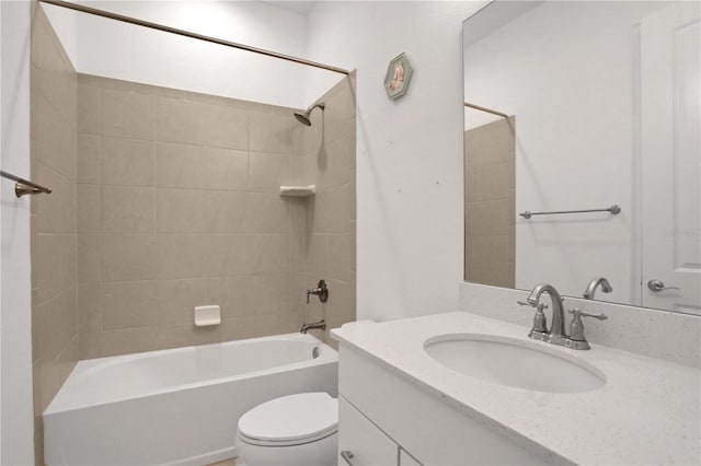 full bath with vanity, toilet, and  shower combination