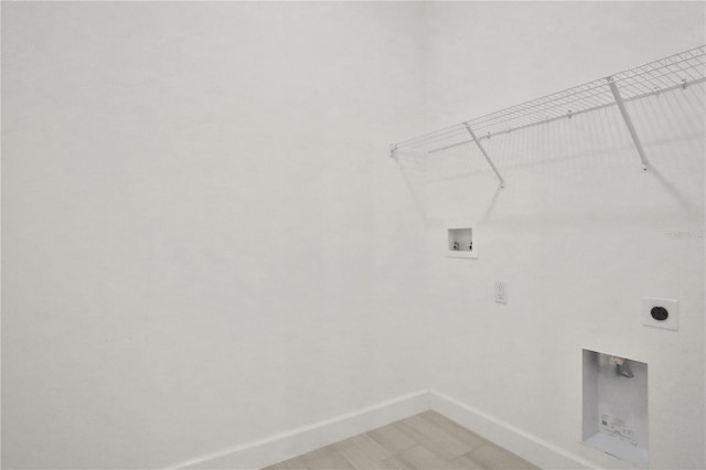 washroom featuring washer hookup, baseboards, laundry area, and electric dryer hookup