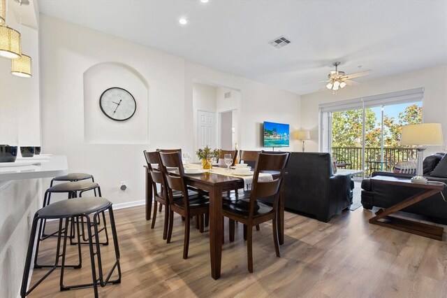 dining space with visible vents, wood finished floors, recessed lighting, baseboards, and ceiling fan