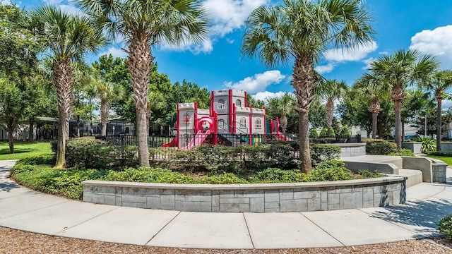 surrounding community with playground community and fence