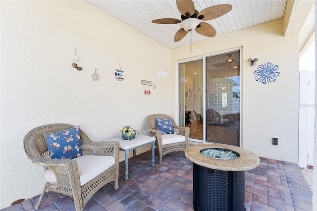 view of patio / terrace with a ceiling fan