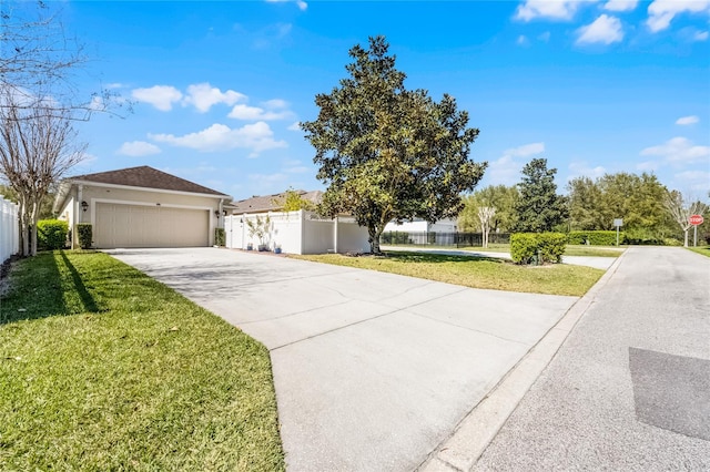 ranch-style home with stucco siding, a front lawn, fence, concrete driveway, and a garage