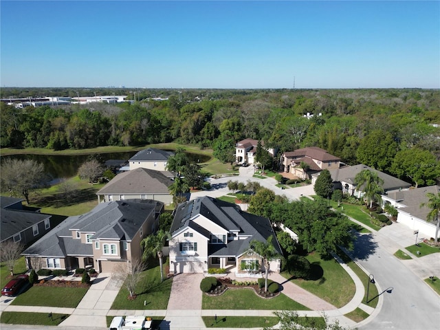 aerial view with a forest view and a residential view