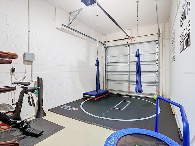 exercise room featuring a garage