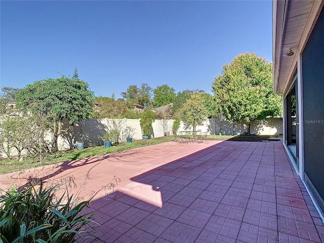 view of patio featuring a fenced backyard